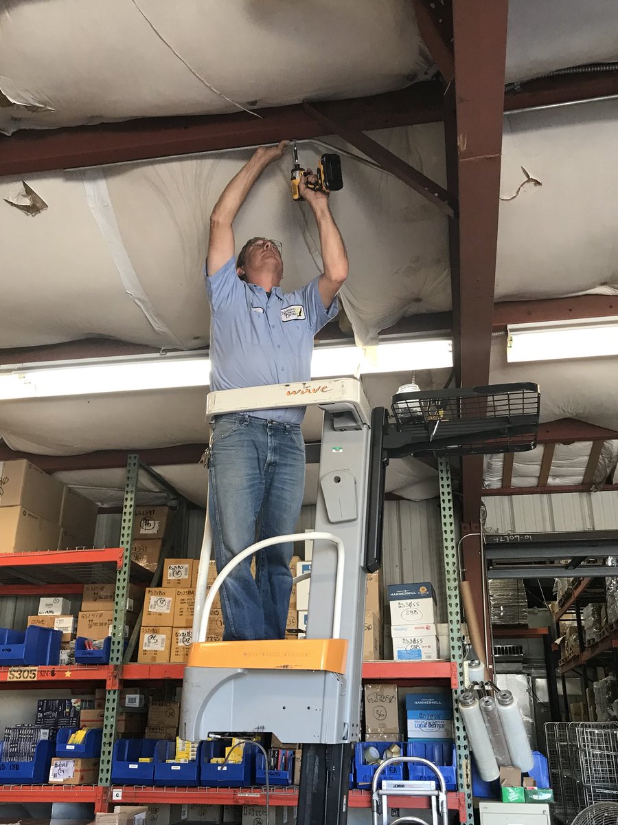SC_NSD's tweet photo. Purchasing: M&amp;O Staff &amp; Contractor installing ductless     A/C unit inside warehouse office.#NSDnow https://t.co/PWApDdKSRo
