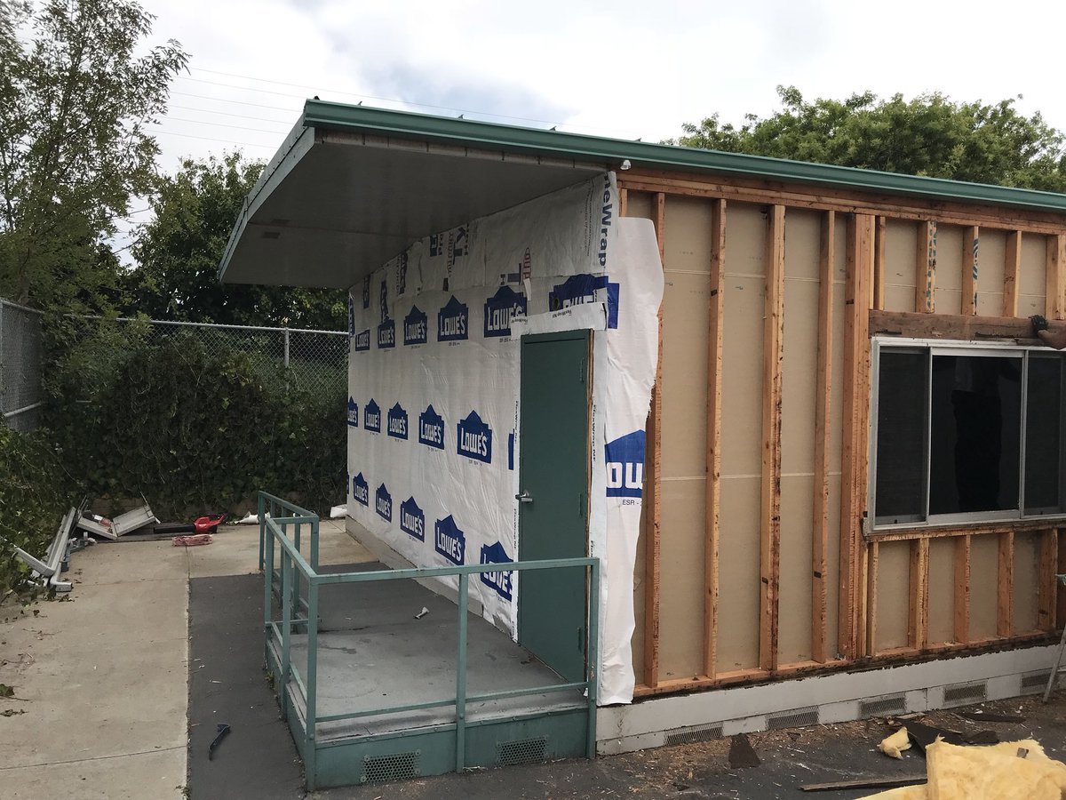 SC_NSD's tweet photo. Olivewood: Exterior Wall Refurbishment Project. Contractor installing new exterior walls to classrooms.#NSDnow https://t.co/3Suy3DgzNN