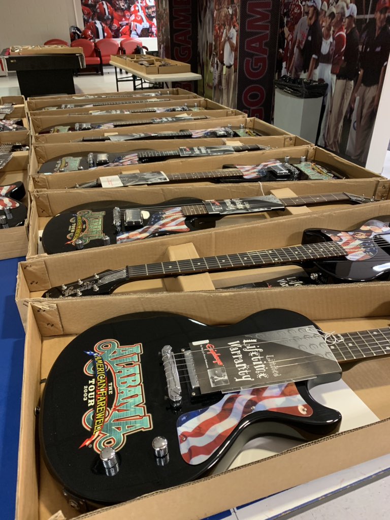 PMcCreless_Star's tweet photo. Rows of guitars on display at the press conference before the start of the Alabama and Friends benefit concert at JSU. All money from the concert will go to JSU’s tornado recovery effort. https://t.co/PAu2aTAjn9