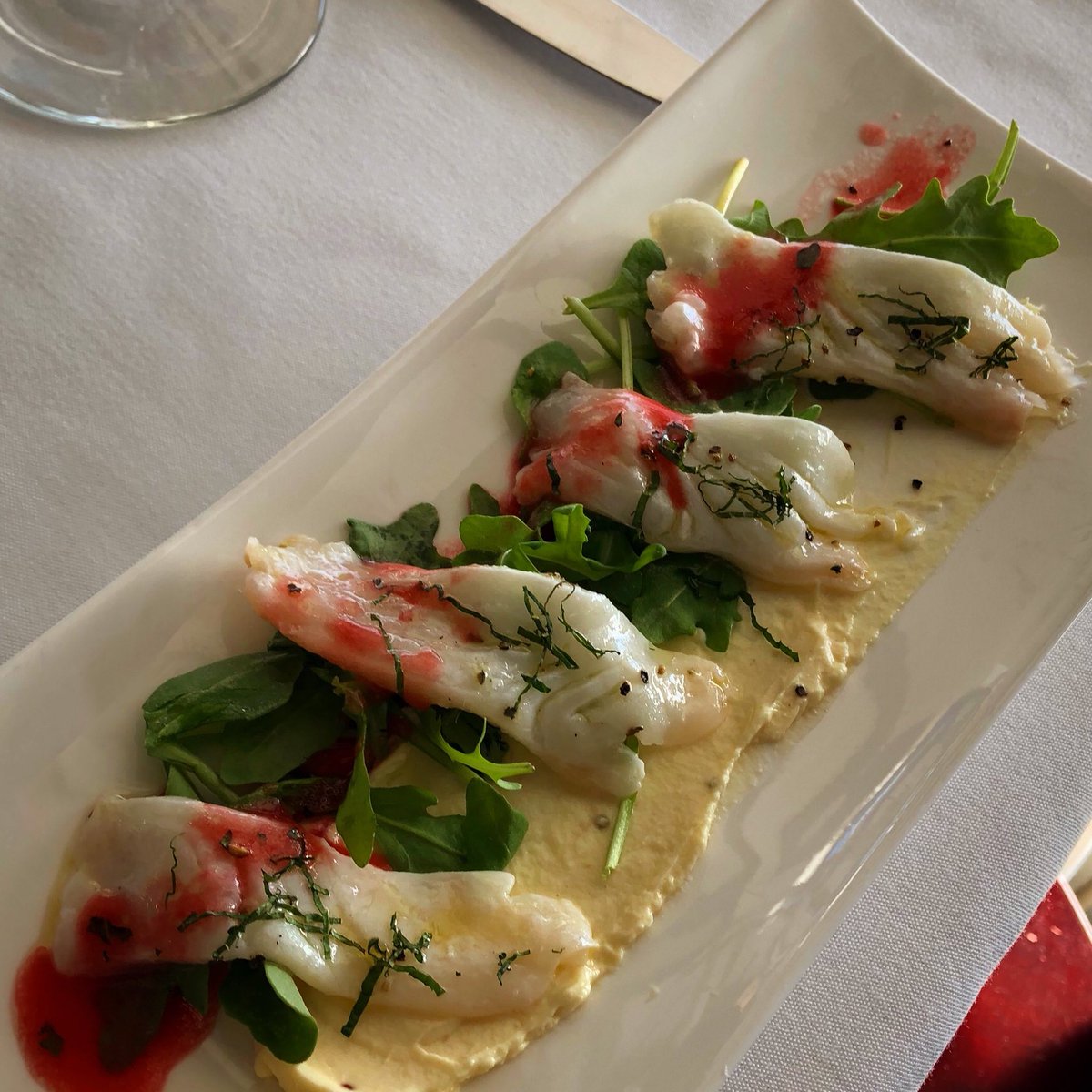 Tonight’s Crudo: Fresh halibut sliced over Dijon marscapone arugula and mint with a prickly pear vinaigrette drizzle.  #crudo #freshfish #marblehead #turtlecovebarandgrille #food #foodie
