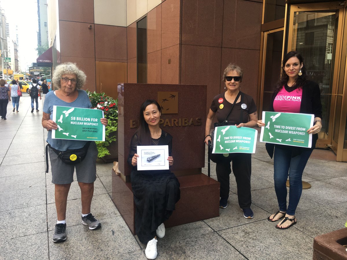 codepink's tweet photo. Today we joined a coalition of activists to tell #BNPParibas, don't bank on the bomb! #CapturetheChange #NuclearBan #DivestFromWar https://t.co/BE71rSvArY