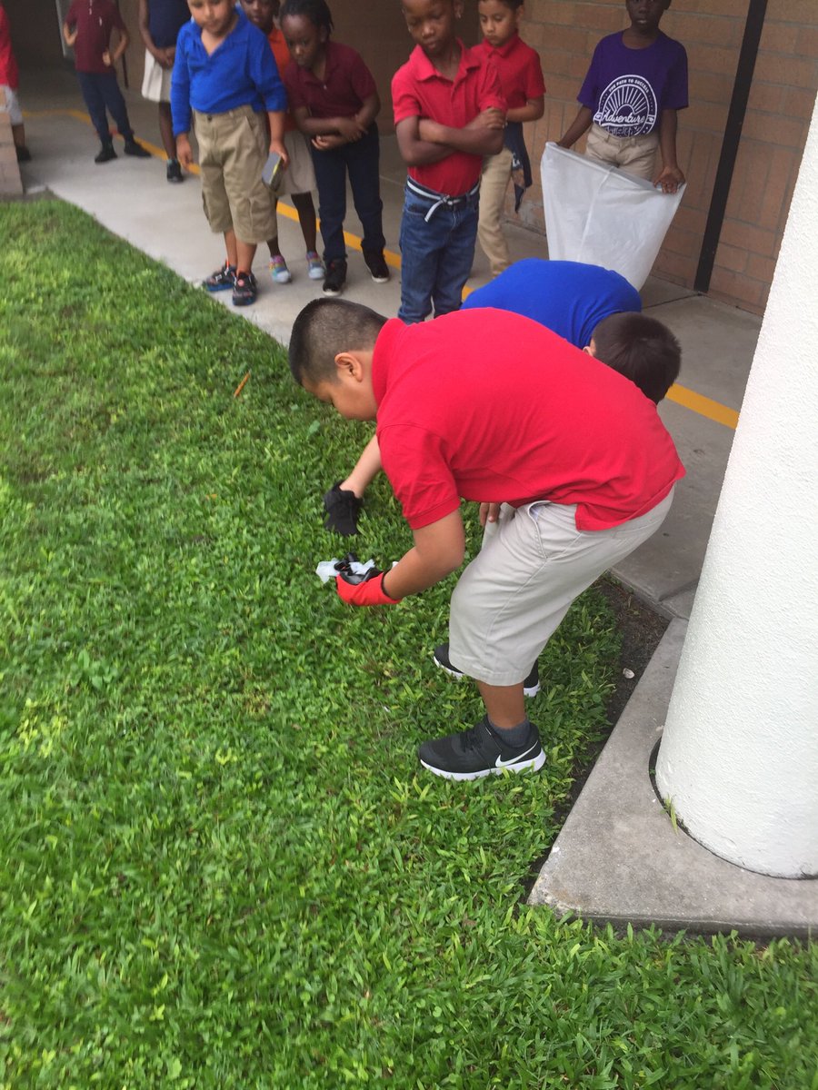watkinka's tweet photo. Our service project was to clean up our yard by the playground. https://t.co/djSxJ7WJ63