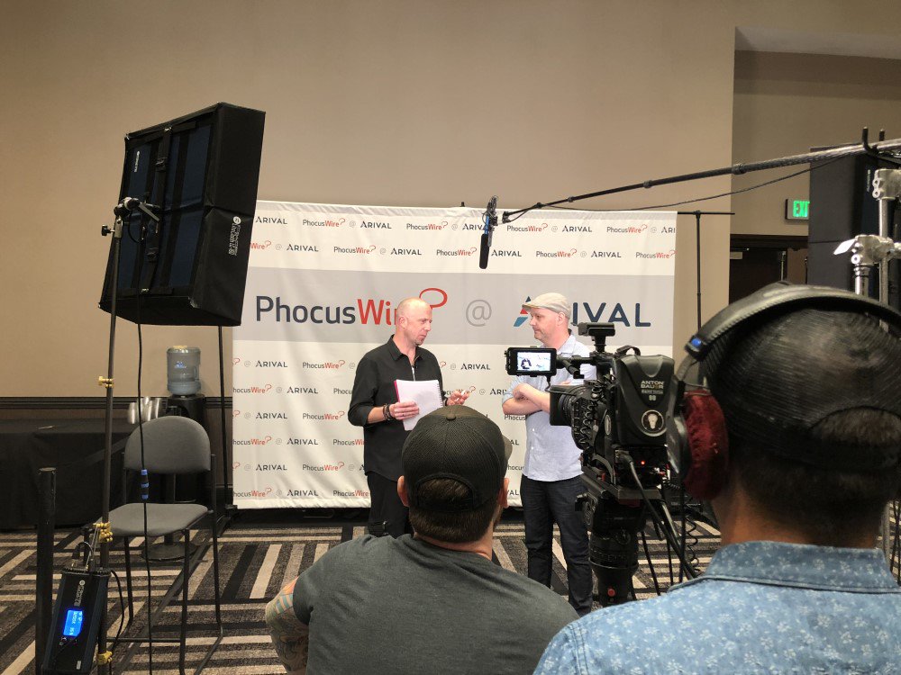 Checkfront's tweet photo. We are so happy to sponsor the @phocuswire @ #Arival Video Lounge. Our CEO, @jasonmorehouse, got to speak with @kevinlukemay about the industry and the @arivalevent experience. The event has been a great success and we are proud to be an overall Launch Partner of #arival2018! https://t.co/KhRvEyHeyx