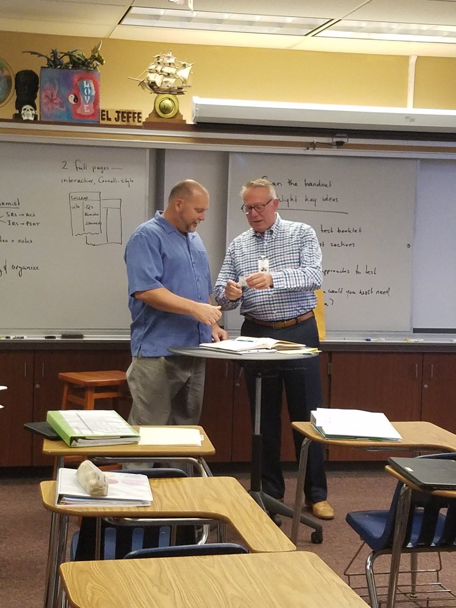 julie_spanier's tweet photo. Mr. Spanier, aka Gentleman Scholar, Voice of the Lancers, 2008 Chili Cookoff Champion, receiving 20 year pin from Mr. Grove today. Congrats! 
@CarlsbadHS
@CarlsbadLancers
#cusdlearns https://t.co/iNt1ctECIC