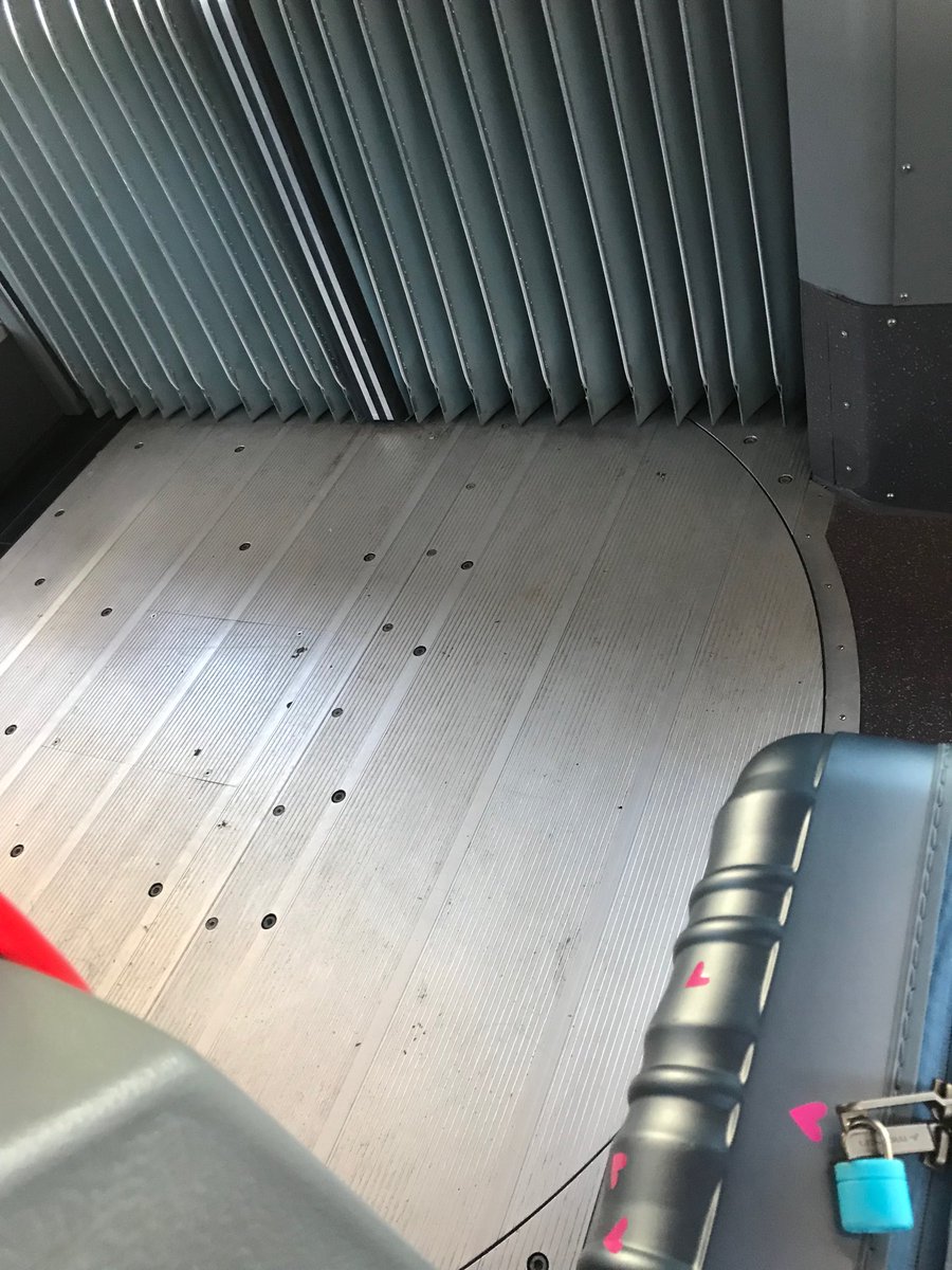 CatrionaBlack's tweet photo. I need some sort of brake on my suitcase. It keeps wheeling off on the airport bus to play on the bendy bus bit. #ibf18 ⁦@islaybookfest⁩ https://t.co/jd2io23TMo