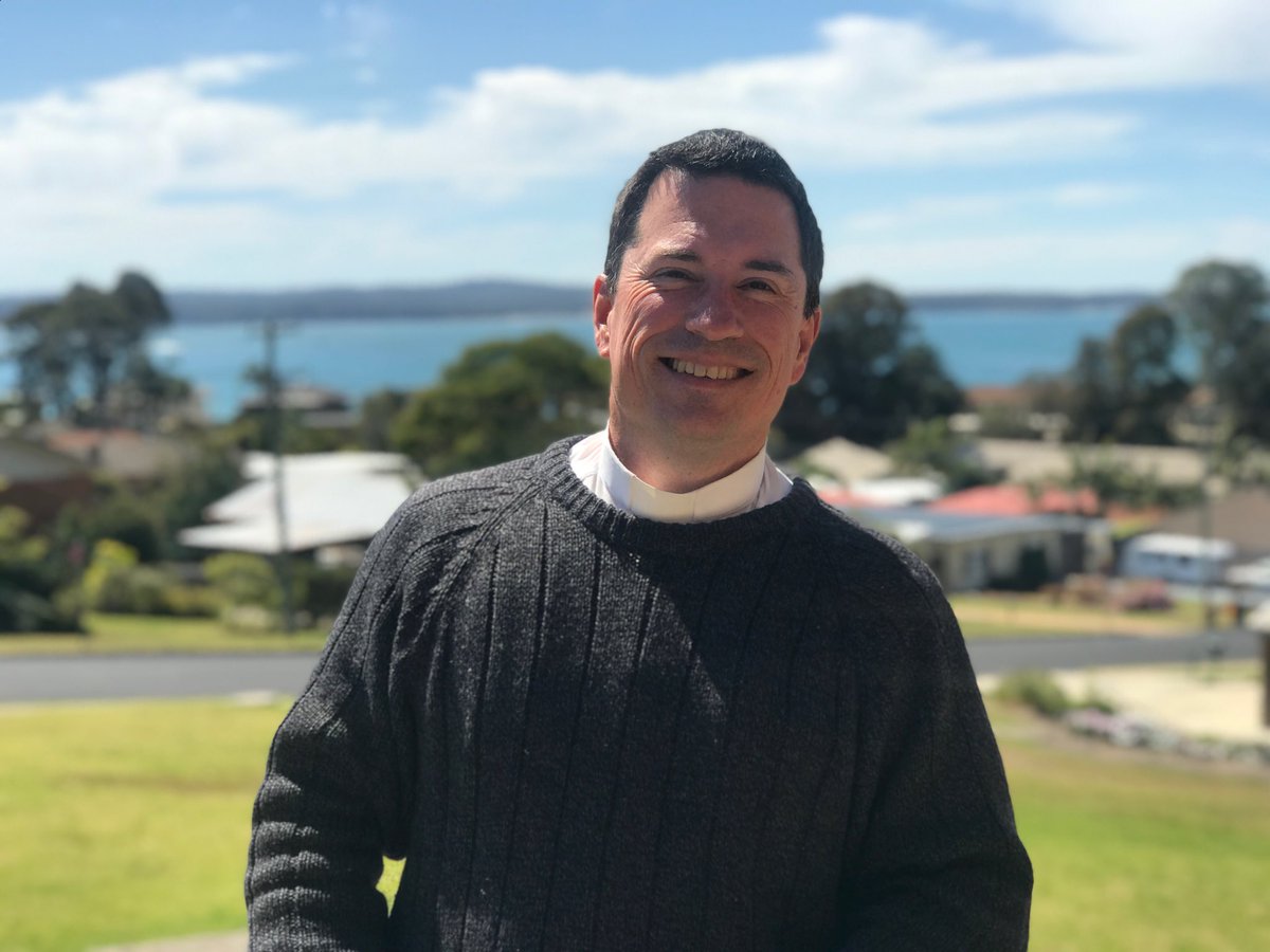 Catholic_Voice's tweet photo. Great meeting up with Fr Dominic at #Batehaven while delivering The Voice. I thought he was smiling because he had such a great view from the Parish Office.... but after he pointed out the journo taking the pic was wearing a V neck jumper backwards... it could have been that. https://t.co/4cTiGgLUlF