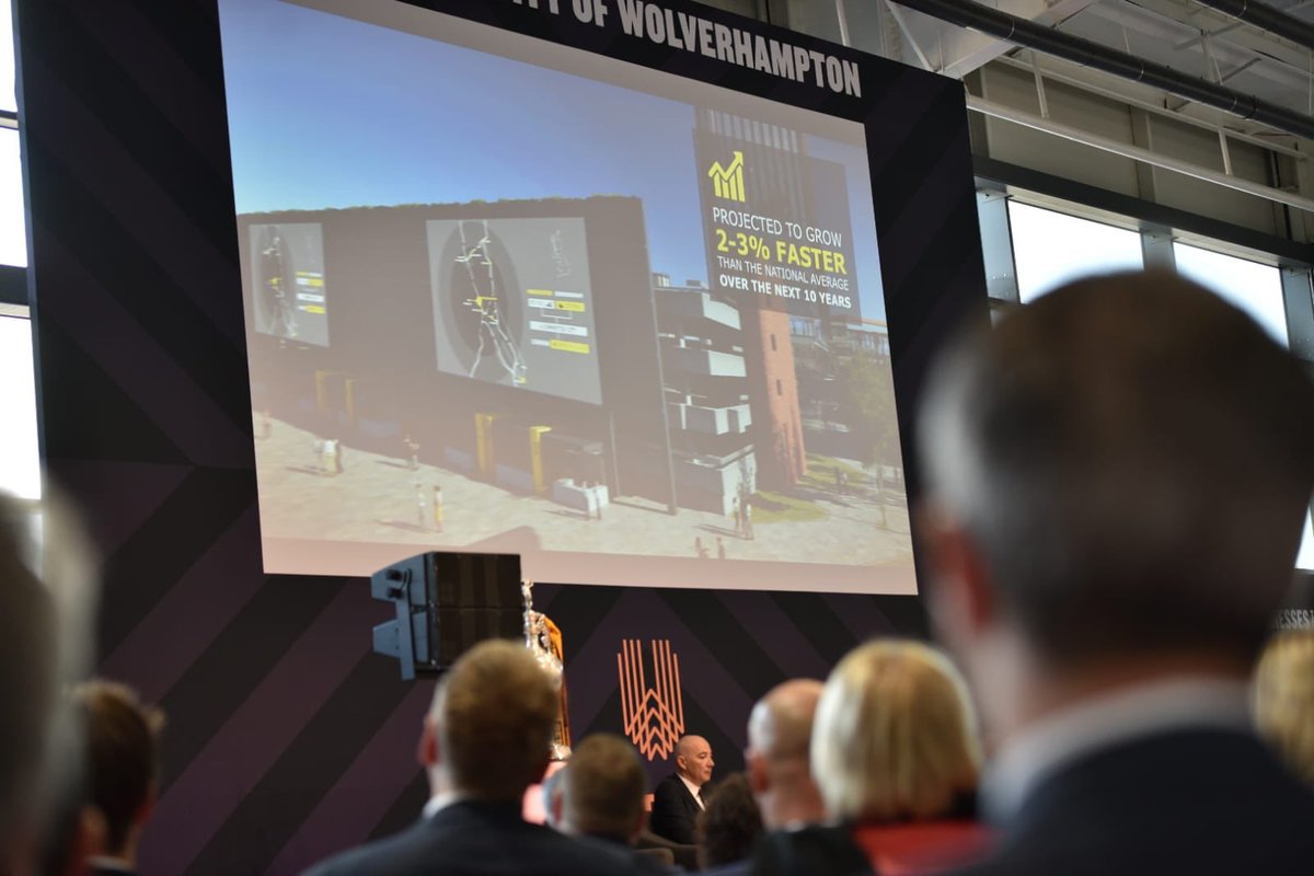 Business Breakfast audience give round of applause to City of Wolverhampton video showcasing Commercial District vision around £150m transport Interchange #investwolves