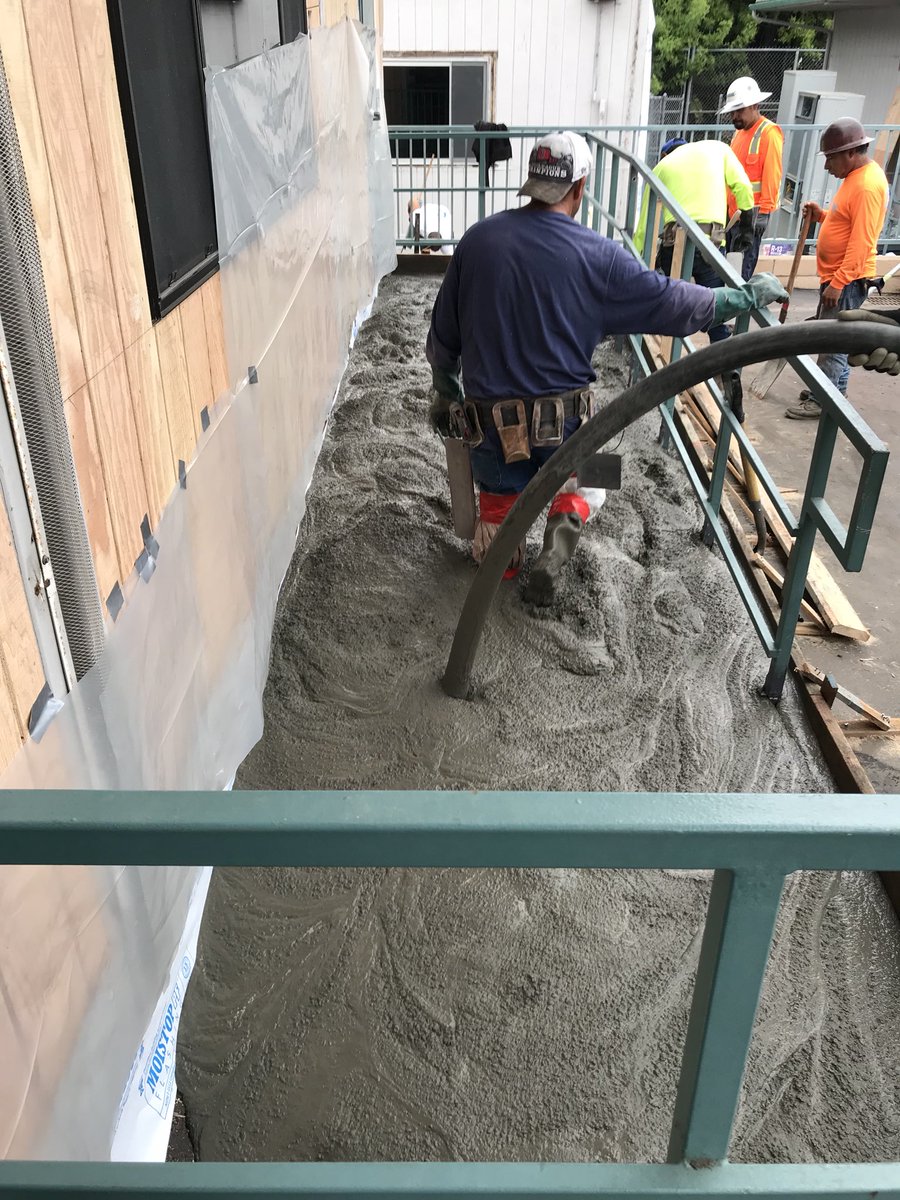 SC_NSD's tweet photo. Olivewood: Classroom Ramps. Contractor pouring concrete. #NSDnow https://t.co/sCp4pCmPgF