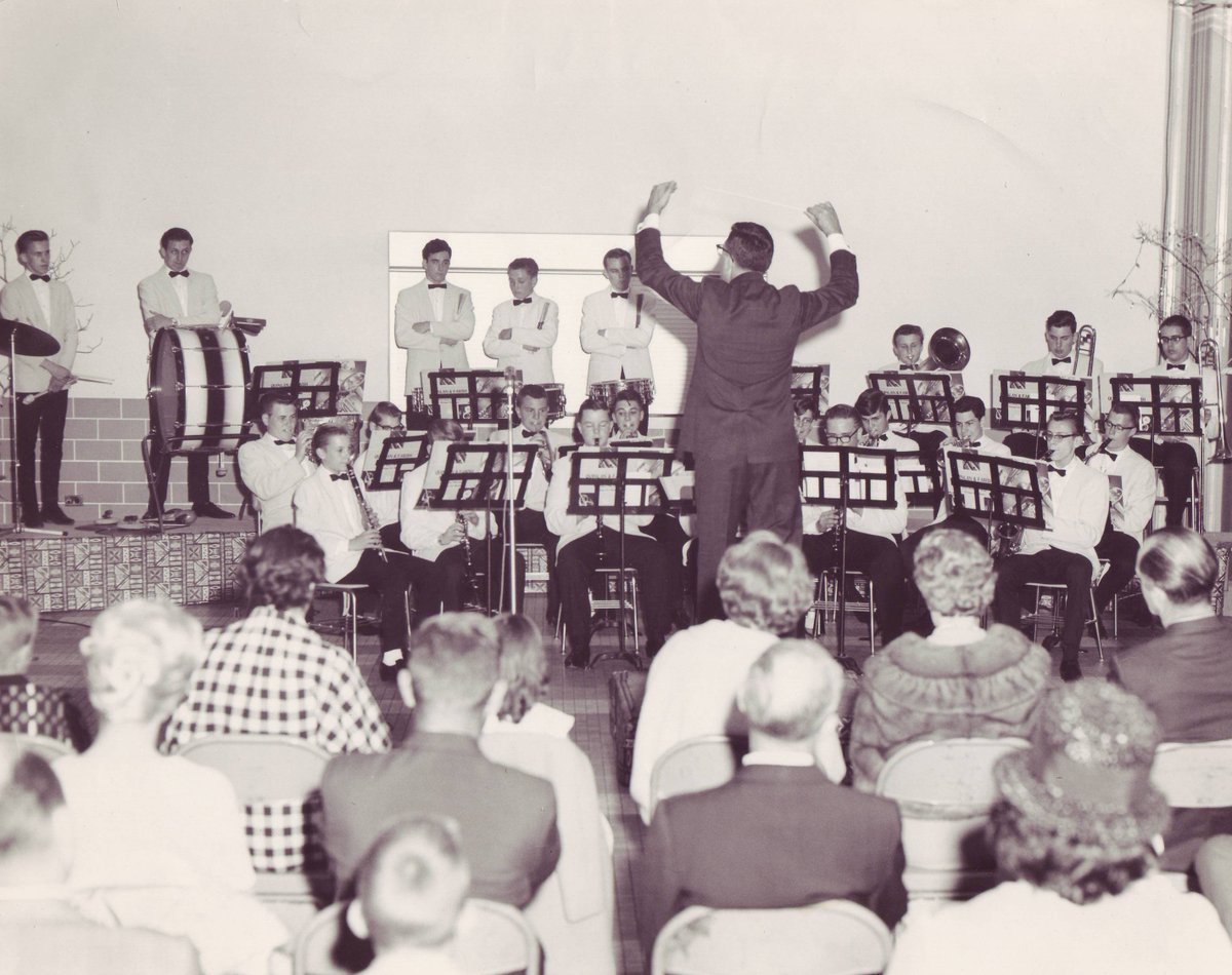 MaristChicago's tweet photo. Mr. Manna conducts a concert in the cafeteria in the early days of the band program! #ThrowbackThursday #Marist55 https://t.co/mDU4faMLQI