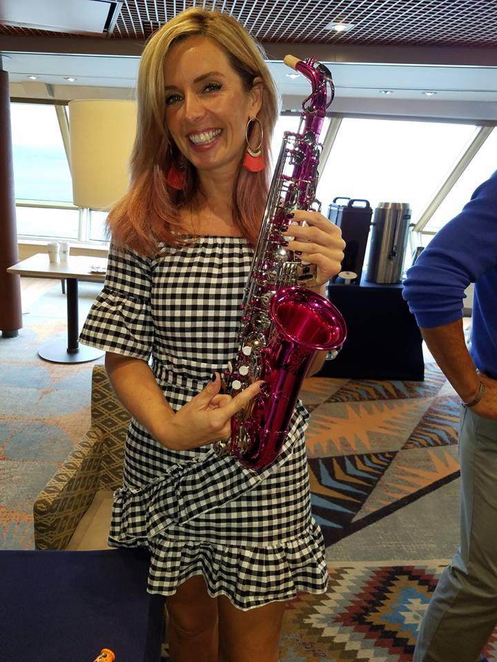 SaxOnTheRiver's tweet photo. .@candydulfer signing last year's pink sax. This year, Candy will be signing this special auction item live on stage before it goes home with the highest bidder! #tbt https://t.co/7BTjAHqrKq