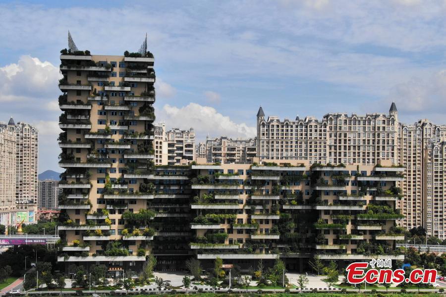 Echinanews's tweet image. A building covered with plants in Jurong City, East China’s Jiangsu Province, looks like a vertical forest