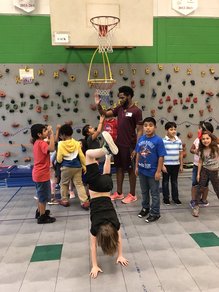 AthletesForHope's tweet photo. AFH member athlete, Omo Osaghae, spent the afternoon running and playing games with the kids from @cookcrocs in Austin. Omo worked with the kids to find their favorite physical activity. Nice move, kid! #MyBestMove https://t.co/M51nwq2Slp