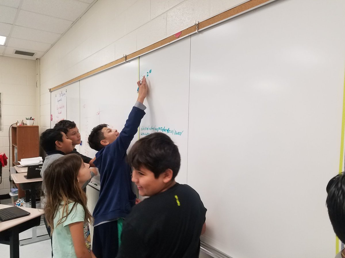 Berman_BRHS's tweet photo. One grain of rice and #vnps for an introduction to exponents. Such different strategies. @principalgusm @KJoliverMath #lcps_math @finnegan54321 https://t.co/2ft41nOMuu