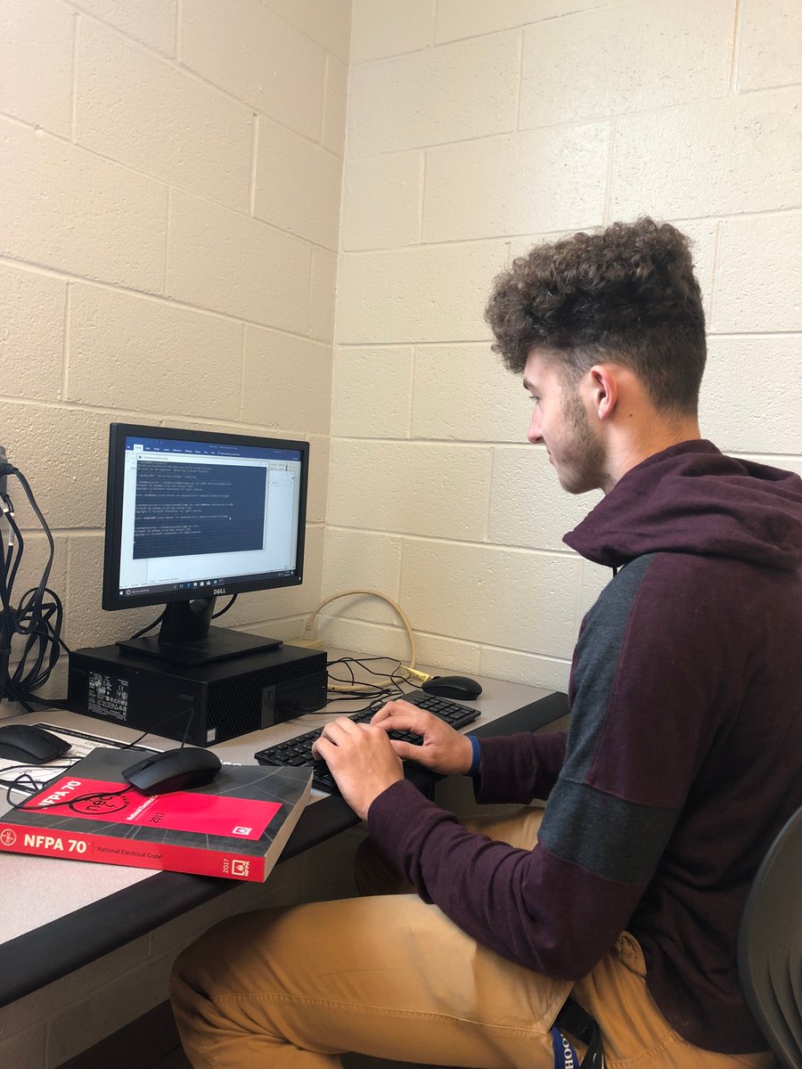 NelsonCoATC's tweet photo. Senior Alex Hite from Thomas Nelson High School, who works in IT at the Central Office, downloading software onto the computers at our very own ATC! #NRGize https://t.co/sL62UExfLZ