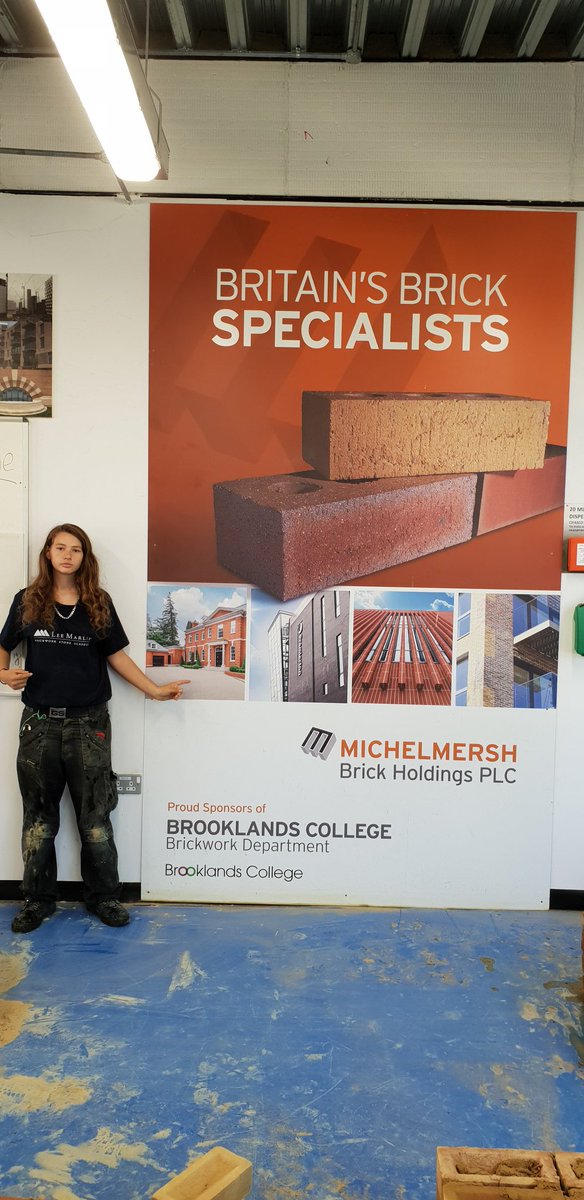 trowel63's tweet photo. Lee Marley brickwork NVQ 2 apprentice @naomiha89155564 showing off one of our brick sponsors @BritainBrickMBH banners in the workshop. @FEBrooklands @bimbricks @frankhanna2 https://t.co/pQyD3WPWuX
