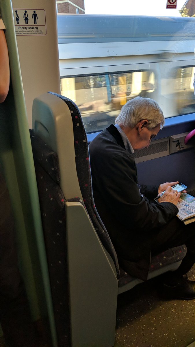 gp171080's tweet photo. @c2c_Rail my baby on board badge on full display but still no one offers a seat and I'm standing right next to this guy...who has seen me by the way. Not great! https://t.co/WA275mXZtk
