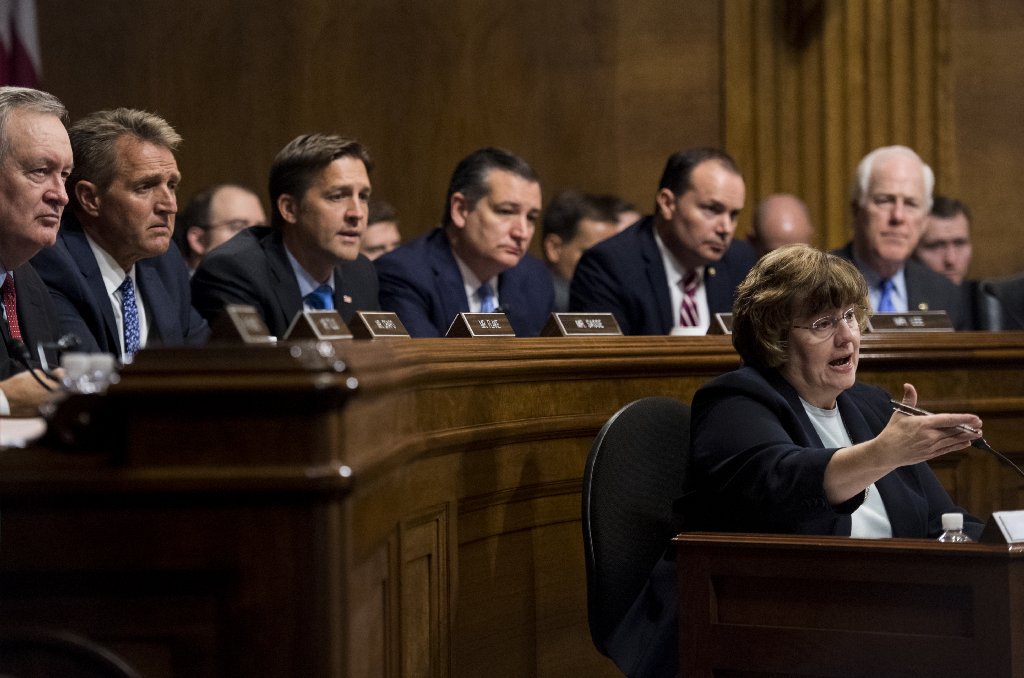 latimes's tweet photo. If you're checking in for an update while the hearing is on break, you can find our latest coverage here: https://t.co/p5VVSEAGXt

Here are scenes from the day in Washington so far: https://t.co/qToW3p4FhI