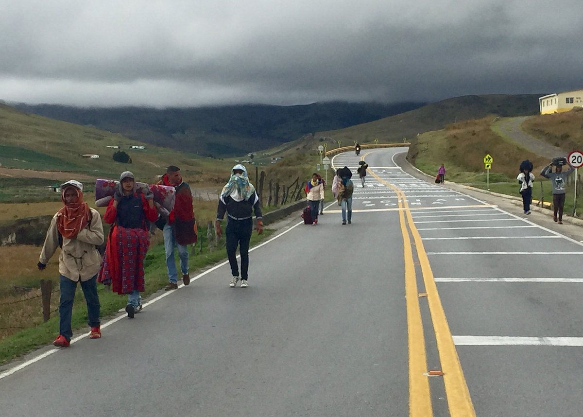 DylanBaddour's tweet photo. More than 100 Venezuelans cross this highland on foot each day. These people started walking at 2 am. Photographed at 4 pm. Many don’t even know exactly where they’re going. But wherever it is, they say they’re sure it’ll be better than home. https://t.co/lgDiPS6ubl