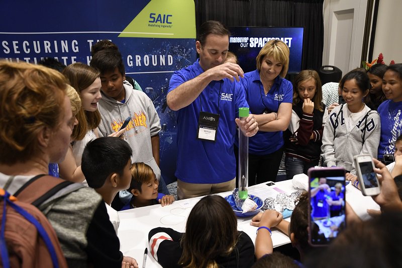 amoscon's tweet photo. 150 Maui County students and 15 STEM teachers attended Space Exploration Day on Friday at the AMOS Conference where they participated in hands-on space-related experiments provided by the #AMOS2018 exhibitors including @SAICinc . https://t.co/UDmk4rDFjZ https://t.co/6Ycrnz9J4y