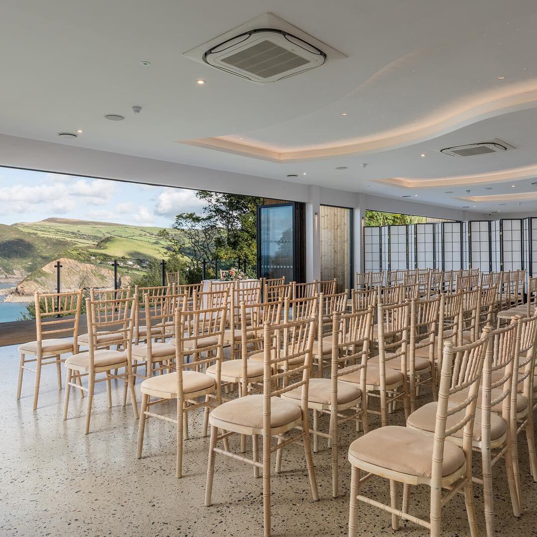hotelsandycove's tweet photo. With the cooler weather coming we have been thinking of the stunning winter Weddings we can have here. The view is breathtaking &amp; the venue with its state of the art lighting and large bi fold doors allows for the outside to come in.#weddingvenue #weddingsbythesea #winterweddings https://t.co/EWfaalD6H2