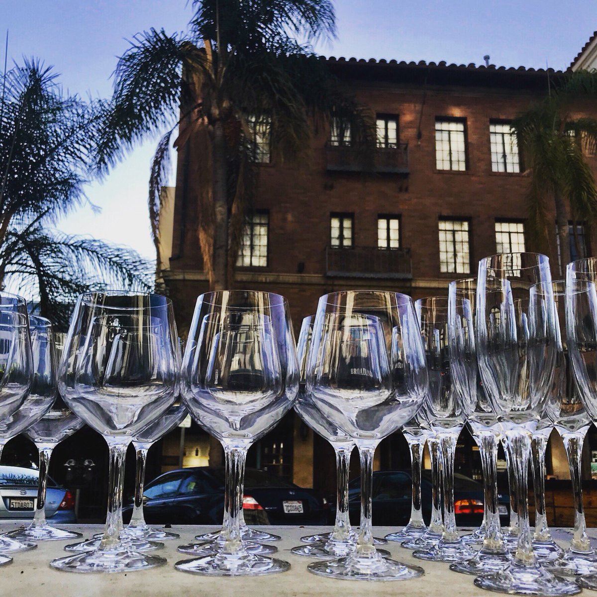 All those glasses just waiting for wine. #tbt to a parklet party at dusk #partytime #districtwine #eastvillage