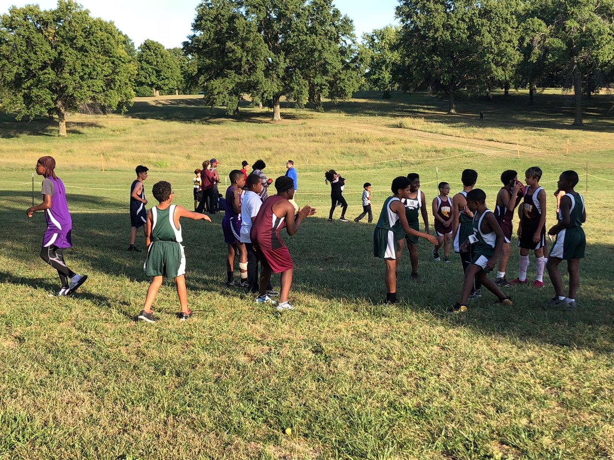 Love these Ss from #kckps playing pickup Fb after completing against each other at XC.