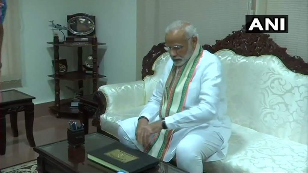 SikarBjp's tweet photo. Jodhpur: Prime Minister Narendra Modi signs the visitors book at the Air Force Station. He will inaugurate the Army exhibition 'Parakarm Parv' at Jodhpur Military Station today, marking the second anniversary of the surgical strike across the LoC. #Rajasthan https://t.co/2ufpYu65Ll