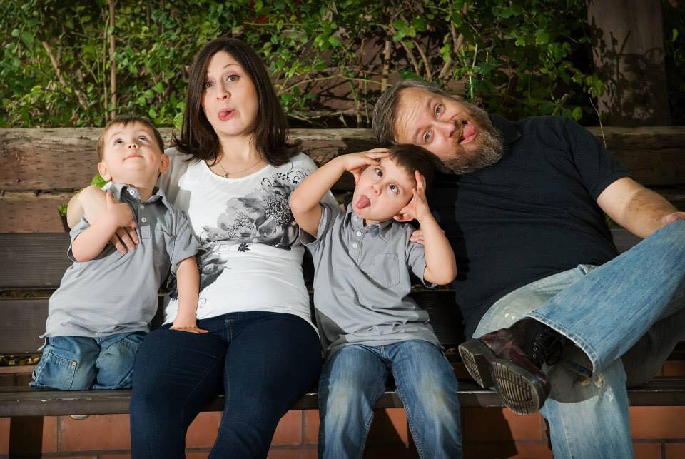 DanandSarahBeth's tweet photo. "The family that plays together, stays together"...right? That seems to be our motto! This is a pic from a photo shoot when we were expecting our daughter. Our boys were just 4 and 2 at the time but they sure were silly! Our daughter is now joining in on the silliness! #FamilyFun https://t.co/KaRTTijDFk