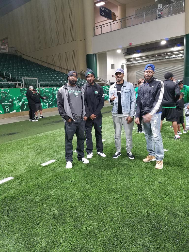 slowmotion1127's tweet photo. Me and my 3 sons at UND after a tough loss 25 to 21, #nevergiveup #striveforsucess https://t.co/Dv89cJOvYG