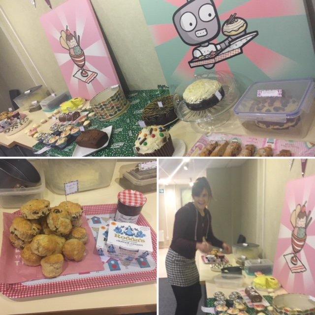 PCS_Shelley's tweet photo. #worldsbiggestcoffeemorning #MacmillanCoffeeMorning Some fantastic creations here at PCS this morning.  Our very own Beth proudly putting her cakes out @PCS_Beth https://t.co/kH33aGEkuY