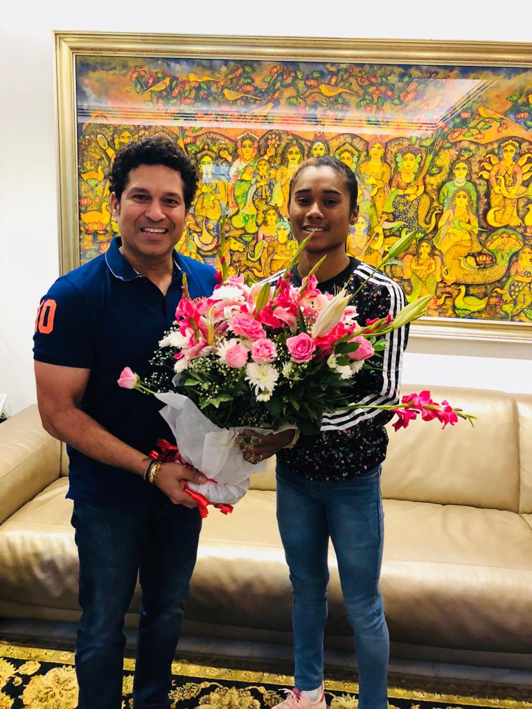 HimaDas8's tweet photo. An overwhelming morning, meeting my legend i always looked upon @sachin_rt sir #dreamcometrue #memorablemorning Thanks sir for this memorable jersey and some motivational talks which will really help me in my career. https://t.co/rNMpAOoq3R