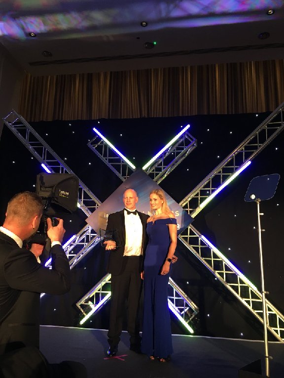 devbankwales's tweet photo. We’re delighted to have won Funder of the Year at the @Insiderwales Dealmaker Awards last night. Here’s our Investment Director Mike Owen collecting the trophy. #WalesDeals https://t.co/B1kGvablwZ