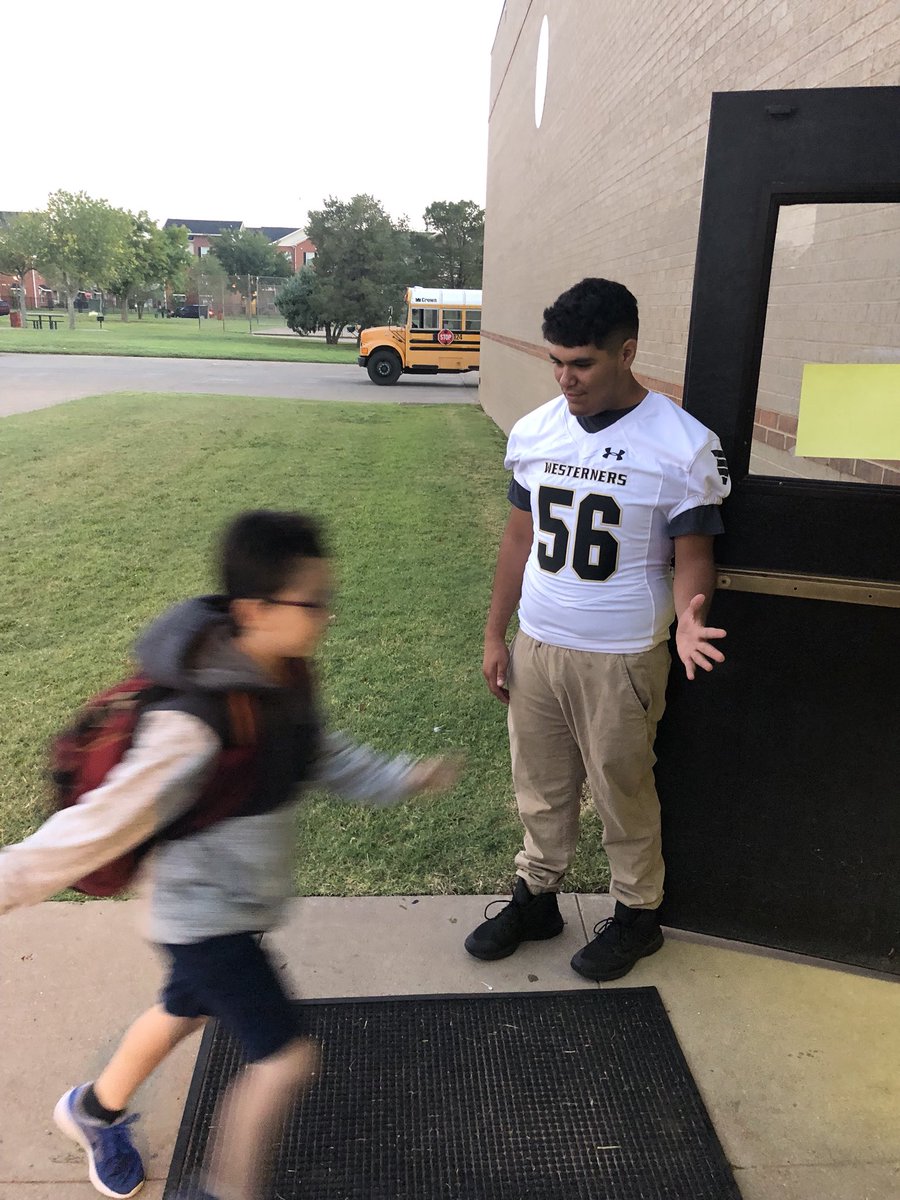 Game day! Players welcoming students to Ramirez Elementary