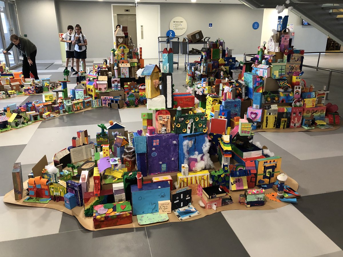 crimmer24's tweet photo. Fabulous effort from Gr1-GR12 S’s @GEMS_Singapore - repurposing boxes to make individualised creative houses with a focus on kindness, contributing to our collaborative Village of Kindness installation. #GEMSinspire #creativity #caring #KindnessMatters @richfhenry @neilwhite72 https://t.co/0a9G4oFw0d