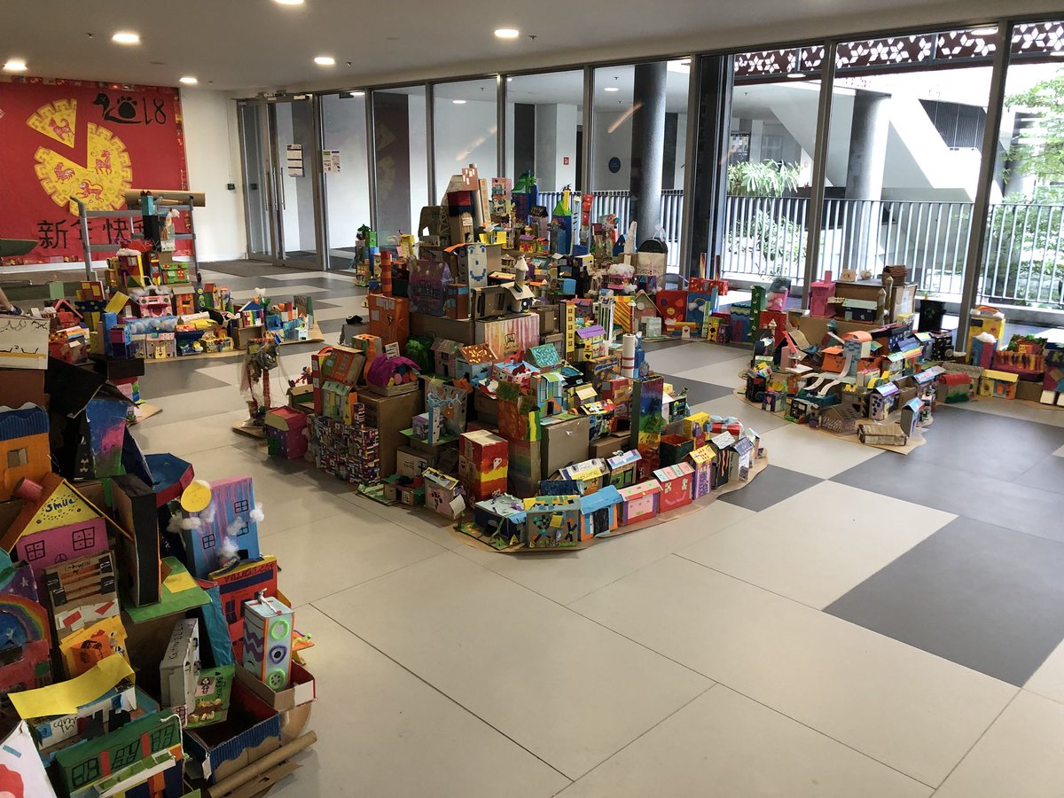 crimmer24's tweet photo. Fabulous effort from Gr1-GR12 S’s @GEMS_Singapore - repurposing boxes to make individualised creative houses with a focus on kindness, contributing to our collaborative Village of Kindness installation. #GEMSinspire #creativity #caring #KindnessMatters @richfhenry @neilwhite72 https://t.co/0a9G4oFw0d