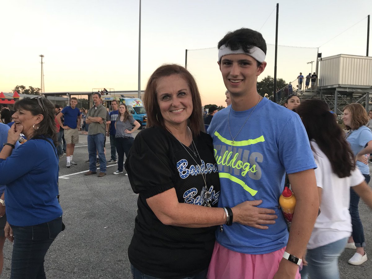 With my favorite senior for my last homecoming as a mom!💗