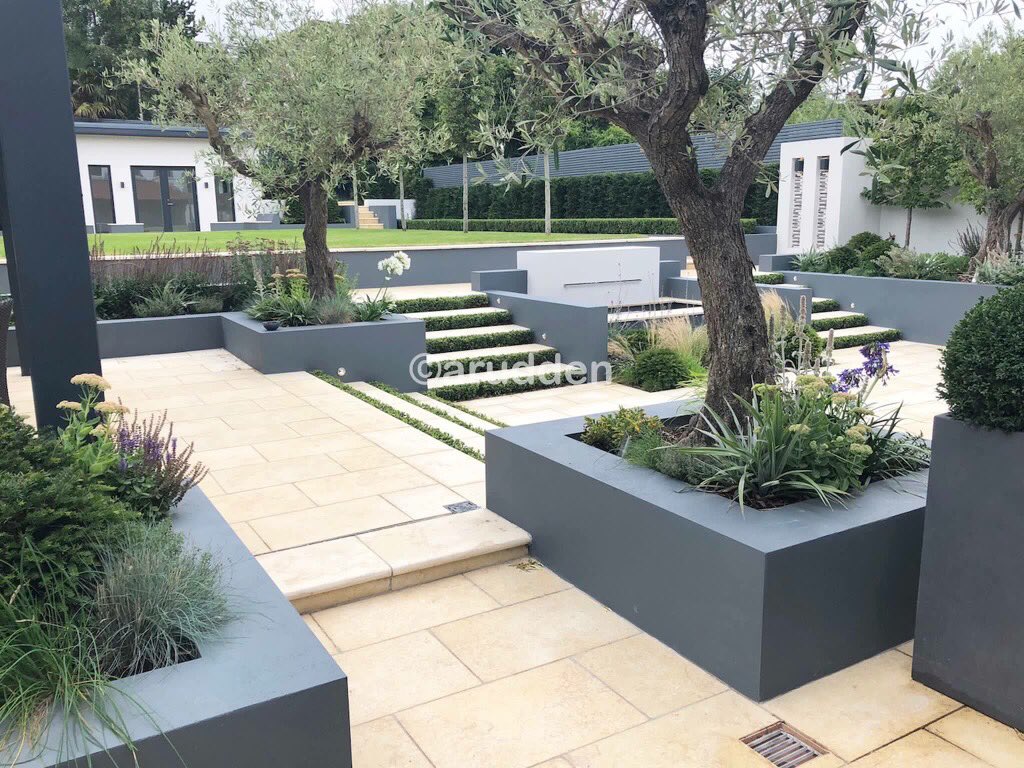 AlanRudden's tweet photo. Some before and after photos of a recent project. This is a good example of a sloping impractical garden which was transformed using terracing to create usable spaces throughout. https://t.co/UR066h1YX7