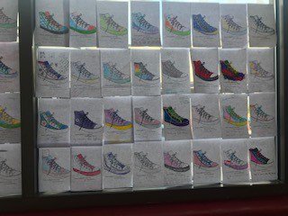 Counselors_HMS's tweet photo. Thank you to HMS students and staff who were willing to be vulnerable and share for our Walk a Mile in My Shoes empathy activity. It was really powerful to see the shoes wrapped all around the fishbowl! https://t.co/66UJgeqmTR