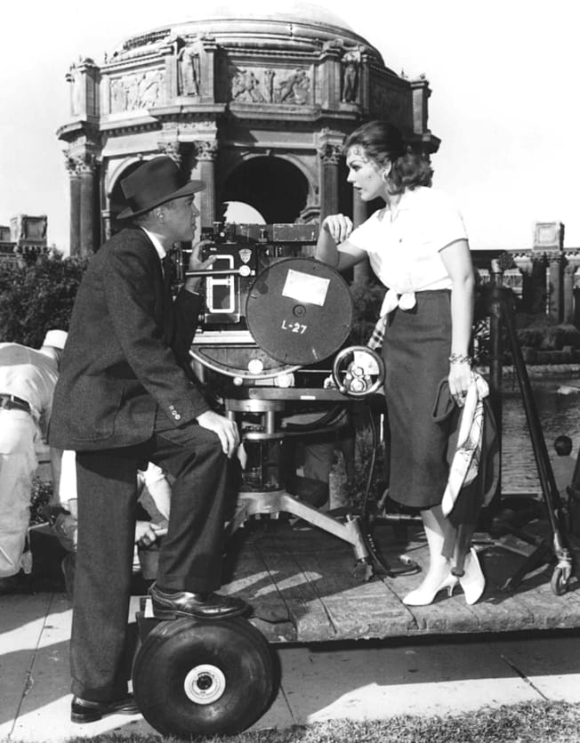 Jimmy Stewart and Kim Novak on the set of Alfred Hitchcock's Vertigo (1958).