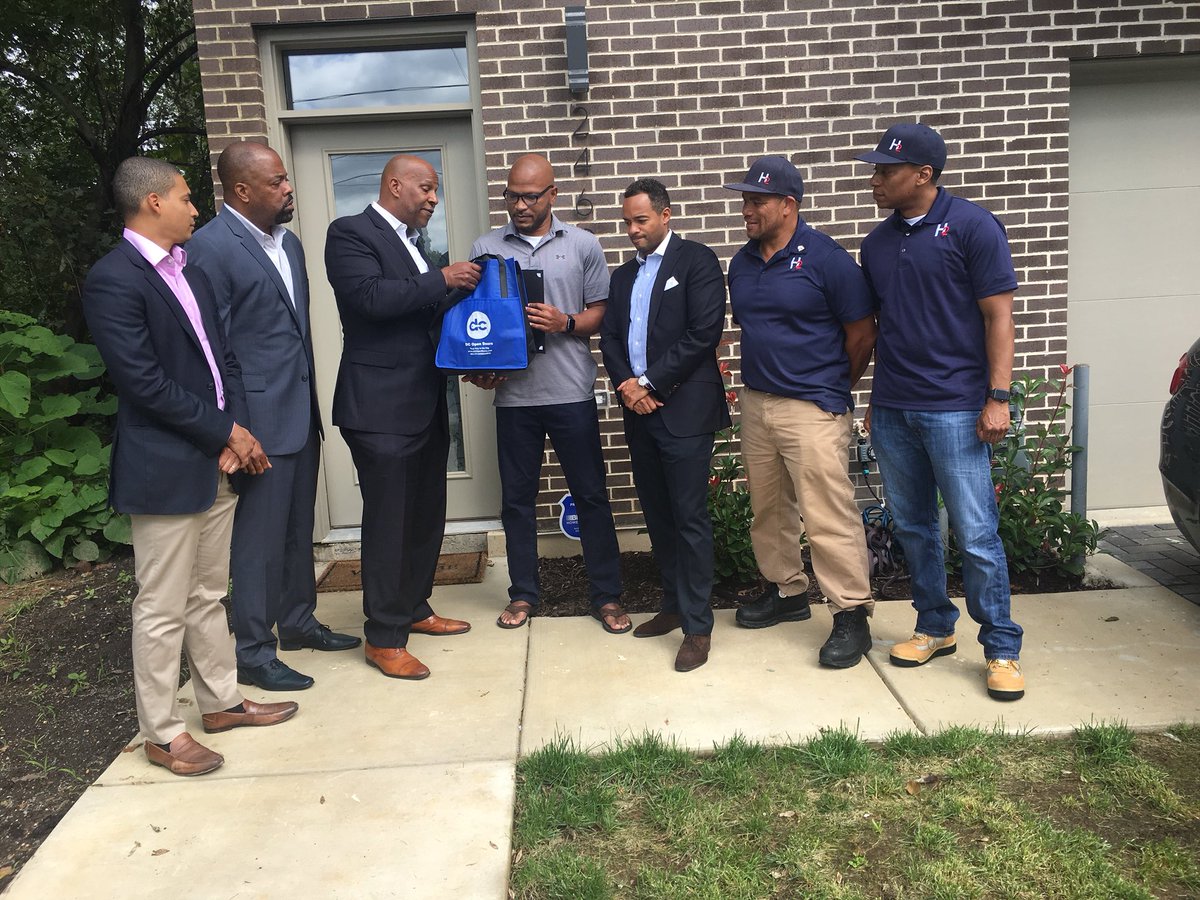 DCHFA's tweet photo. And of course our Executive Director @ToddLeeDCHFA came ready to present the new homeowners with a welcome gift bag from the DCHFA family. Congrats to these new homeowners and we look forward to helping more people become homeowners in the District. #dchfahip #RootsToRoofs https://t.co/k2FL74WQsg