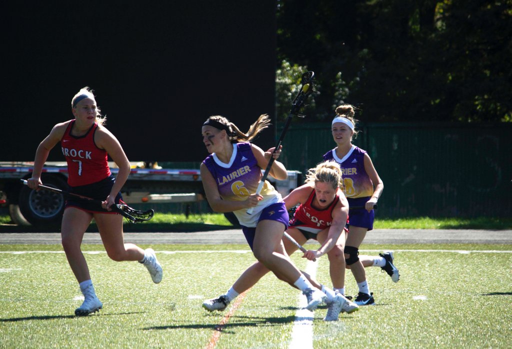 WLUAthletics's tweet photo. This weeks #PhotoFeatureFriday we featuring WLAX and Cross Country!👏 👏 👏These Teams showed they're passion and hard work this week💪 Swipe to see more #GoldenHawk athletes making Laurier Proud! #WeAreHawks💜 💛 
📸 : Claire Shafto &amp; Jason Zilli https://t.co/RHV8wCScmY