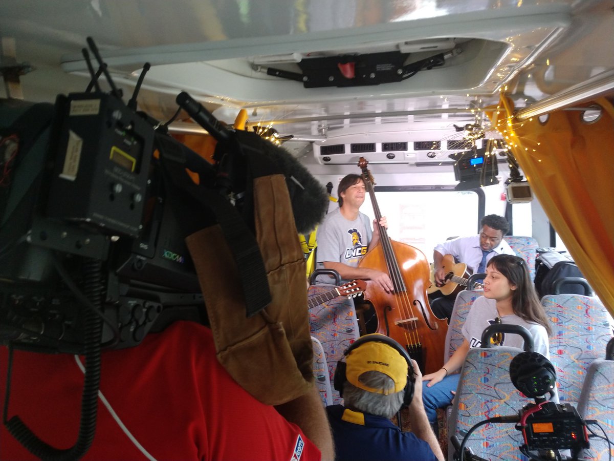 jeffshaferPR's tweet photo. This is about to be a one of a kind bus ride with @uncg @UNCGChancellor on @greensborocity #TinyBusGSO #UNCGWay https://t.co/qgq3HSTKrw