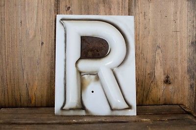 SignMuseum's tweet photo. Opal glass is created by mixing impurities into glass to give it an opaque or milky appearance. The mixture is poured into a slump mold, creating a letter with a rectangular outline that can be clipped into the back of a sign, showing only the letter section. #opalglass (3/4) https://t.co/RHcVeXoql5