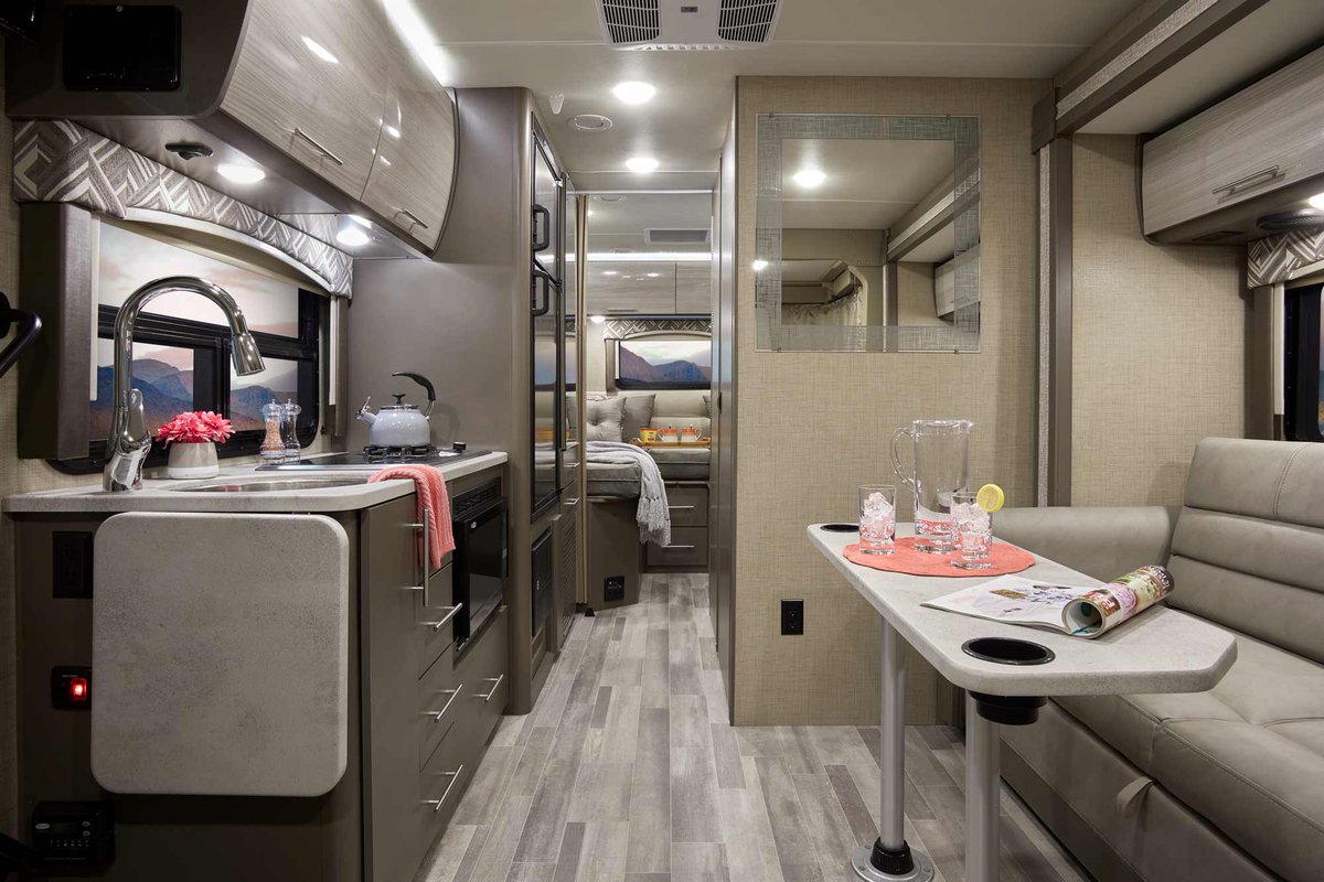 ThorMotorCoach's tweet photo. As you step into the Axis 24.1, right away you notice the beautiful Euro-style cabinet doors and styling. Built on a Ford E-series chassis, this RUV is very easy to drive, a comfortable ride, and has all you need on the road. https://t.co/u7YVtGkDF0 #ThorMotorCoach #ThorAxis https://t.co/JKXoruFqqh
