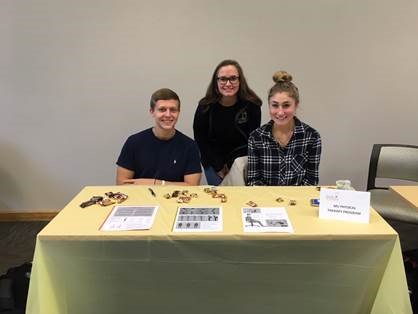 MUHealthScience's tweet photo. Attached is a photo from the Health Fair sponsored by the Health Center. Both undergraduate Pre-DPT students and graduate DPT students presented information on backpacks and back health.  Pictured is Nicholas Toronzi 2024, Jacquelyn Bamberski 2019, Shelby Brittain 2024. https://t.co/MC24XNUuse