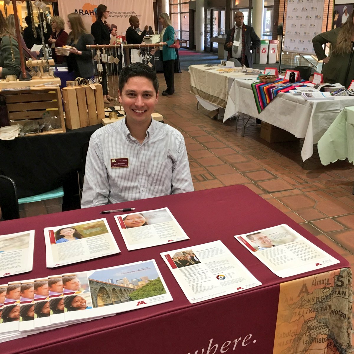HHHSchool's tweet photo. Are you in the building today for @MinnesotaNGOs #MINNSummit? Stop by the global marketplace and say hi to our admissions program manager, Jacob! He’d love to talk to you about how we can help you change the world. #getMINNspired https://t.co/Eu3OZN98cy