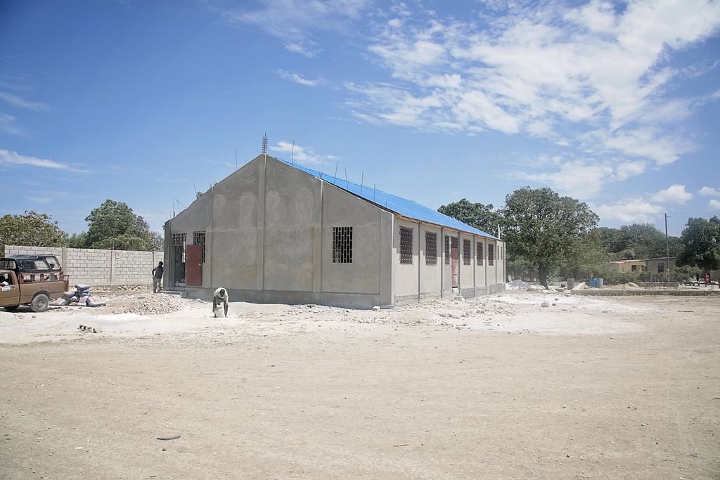ChanjeMovement's tweet photo. Last year at the Chanje Golf Classic &amp; Gala we were able to raise the funds for this mulipurpose building.  We are so thankful to have this place to host events, medical clinics. and church services for the community.  We hope you can join us this year!  #signup https://t.co/6N5dtLDQgp