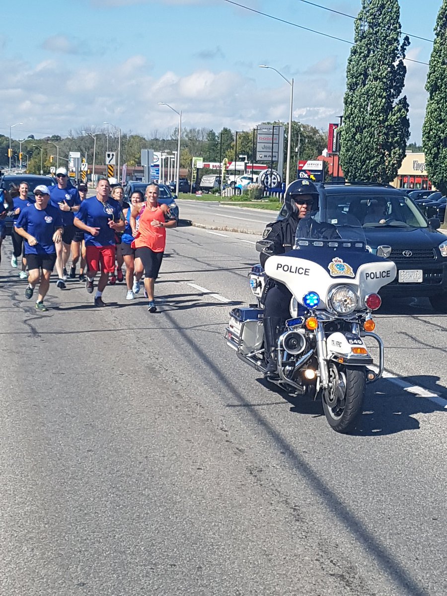 theeofficer's tweet photo. From Toronto all the way to Ottawa, 2 @WRPSToday bike officers leading the way! Way to go boys #runtoremember https://t.co/oB9zOA8QDD