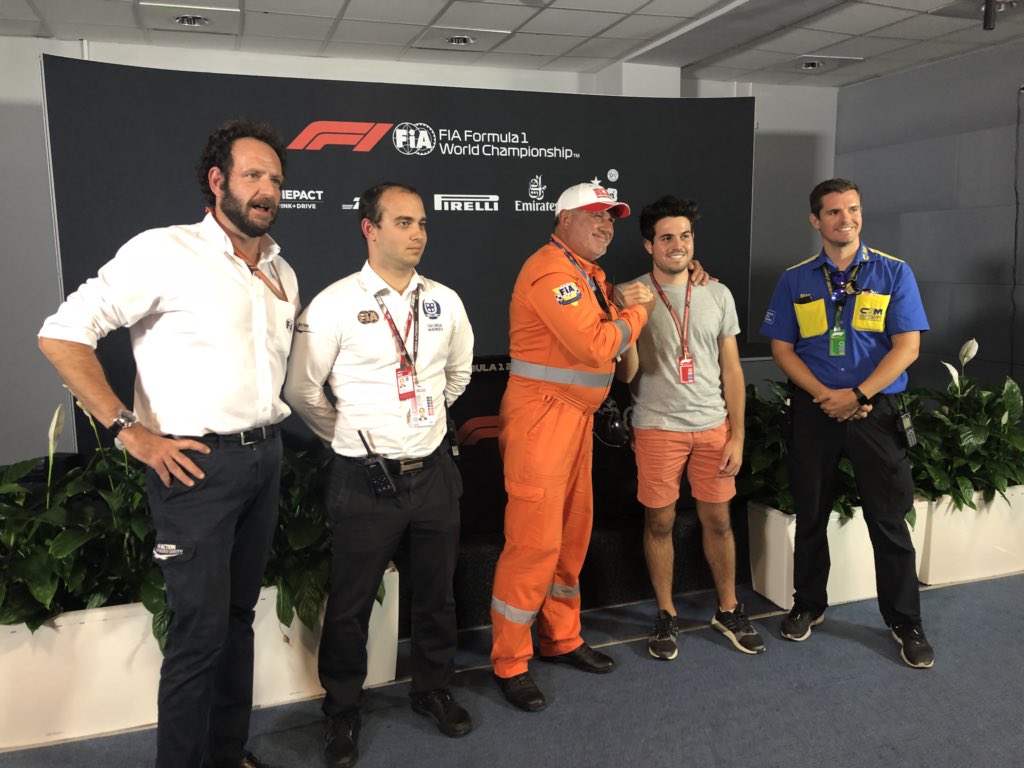 MatteoBonciani's tweet photo. Great to see that whatever their differences, people in F1 can find a good resolution and make a great sporting event happen. Top marks to FIA marshal Roman Petrenko and FIA photographer Zak Mauger for being bigger men today @SochiAutodrom @F1 https://t.co/60bmn55tRL