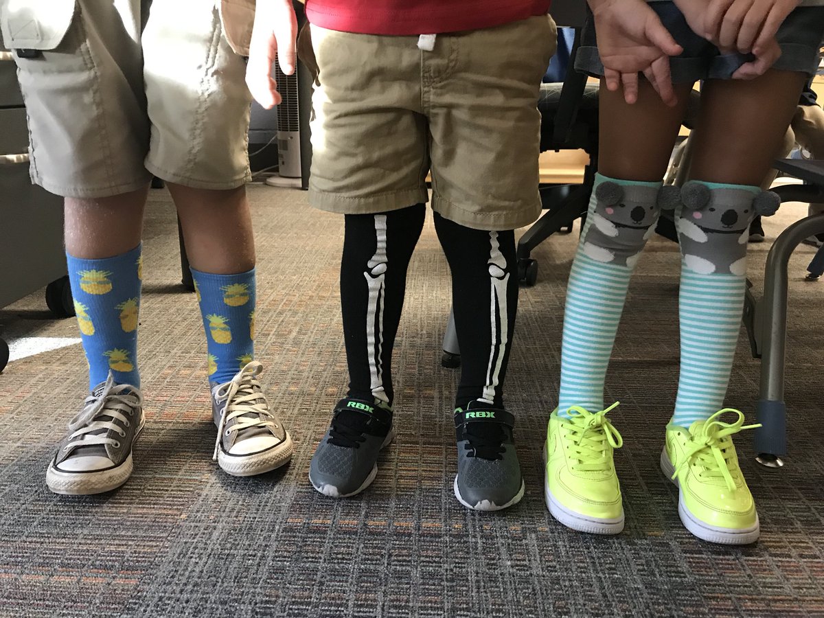 Look at our crazy socks! #crazysockday #angeloakes